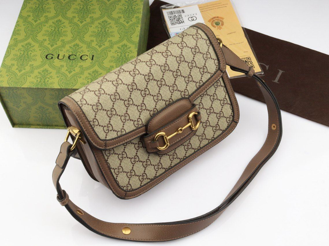 Gucci GG Supreme Shoulder Bag with Horsebit Closure