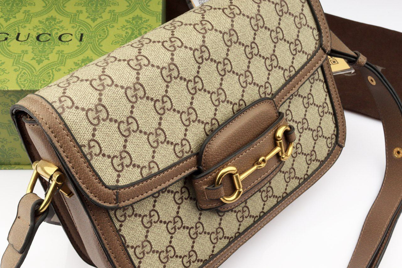 Gucci GG Supreme Shoulder Bag with Horsebit Closure